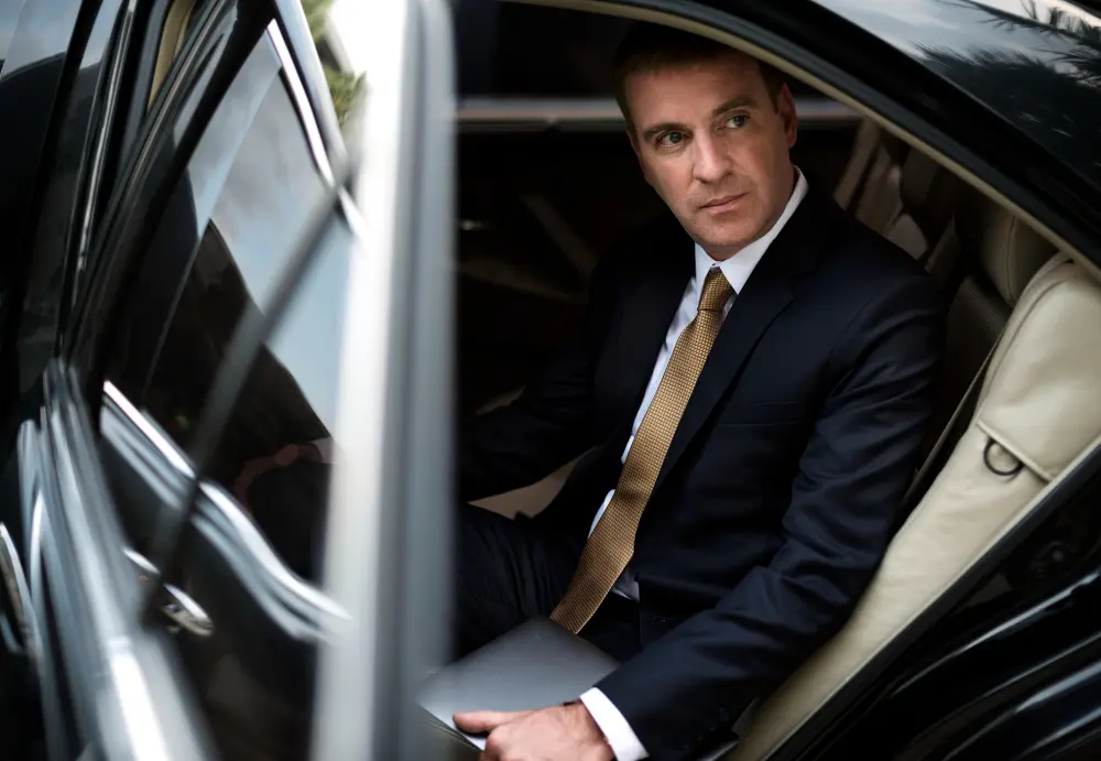 Corporate Limo Service businessman-going-out-his-car
