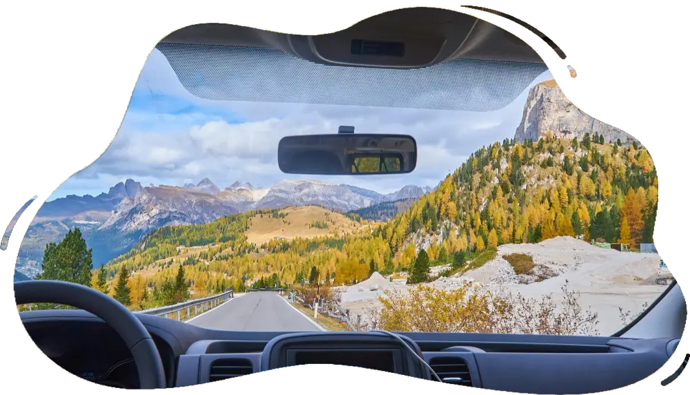 Nature Tours view-alps-through-windscreen-car-while-driving-curvy-road
