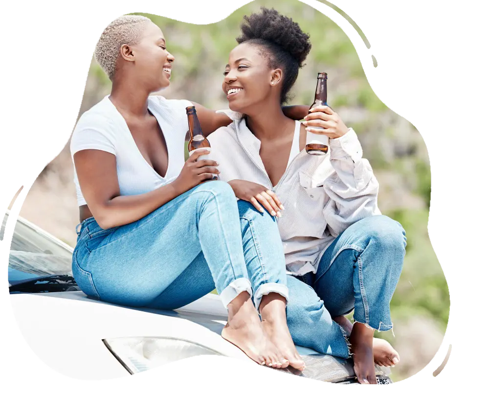 car-beer-relaxing-nature-together-summer-drinking-alcohol-outdoors-drunk-smile-happy-african-lgbt-girls-women-fun-relationship-friendship